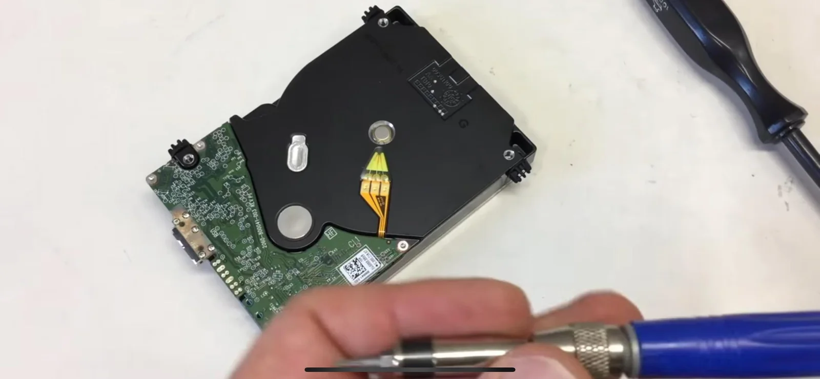 The actual WD_BLACK 4TB case drive on the Wildfire laboratory bench with its circuit board removed